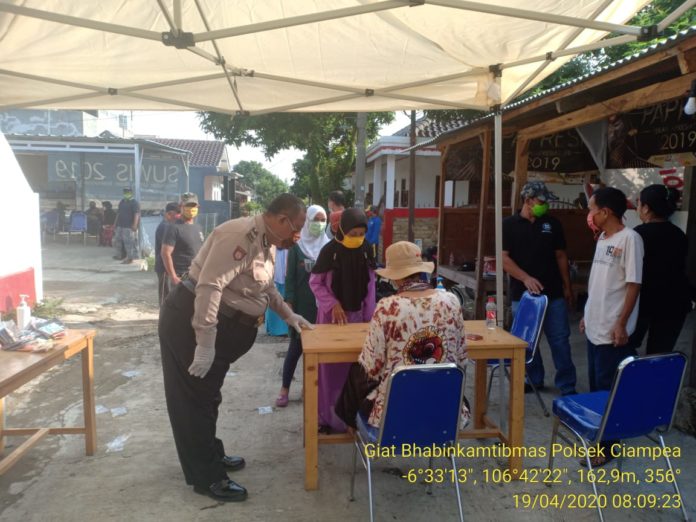 Hadiri Santunan Anak Yatim, Ini Pesan Kanit Sabhara Polsek Ciampea Kepada Ratusan Anak Yatim di Desa Cibanteng