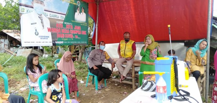 Antisipasi Penyebaran Covid-19, Bhabinkamtibmas Polsek Ciampea Cek Pos Pantau Di Desa Ciampea Udik