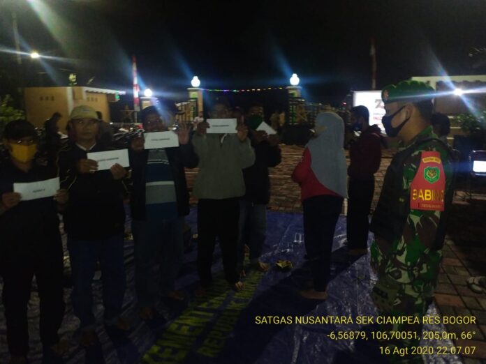 Bhabinkamtibmas Polsek Ciampea Jalin Kemitraan dengan hadiri Pertemuan RT, RW Desa Tegalwaru.